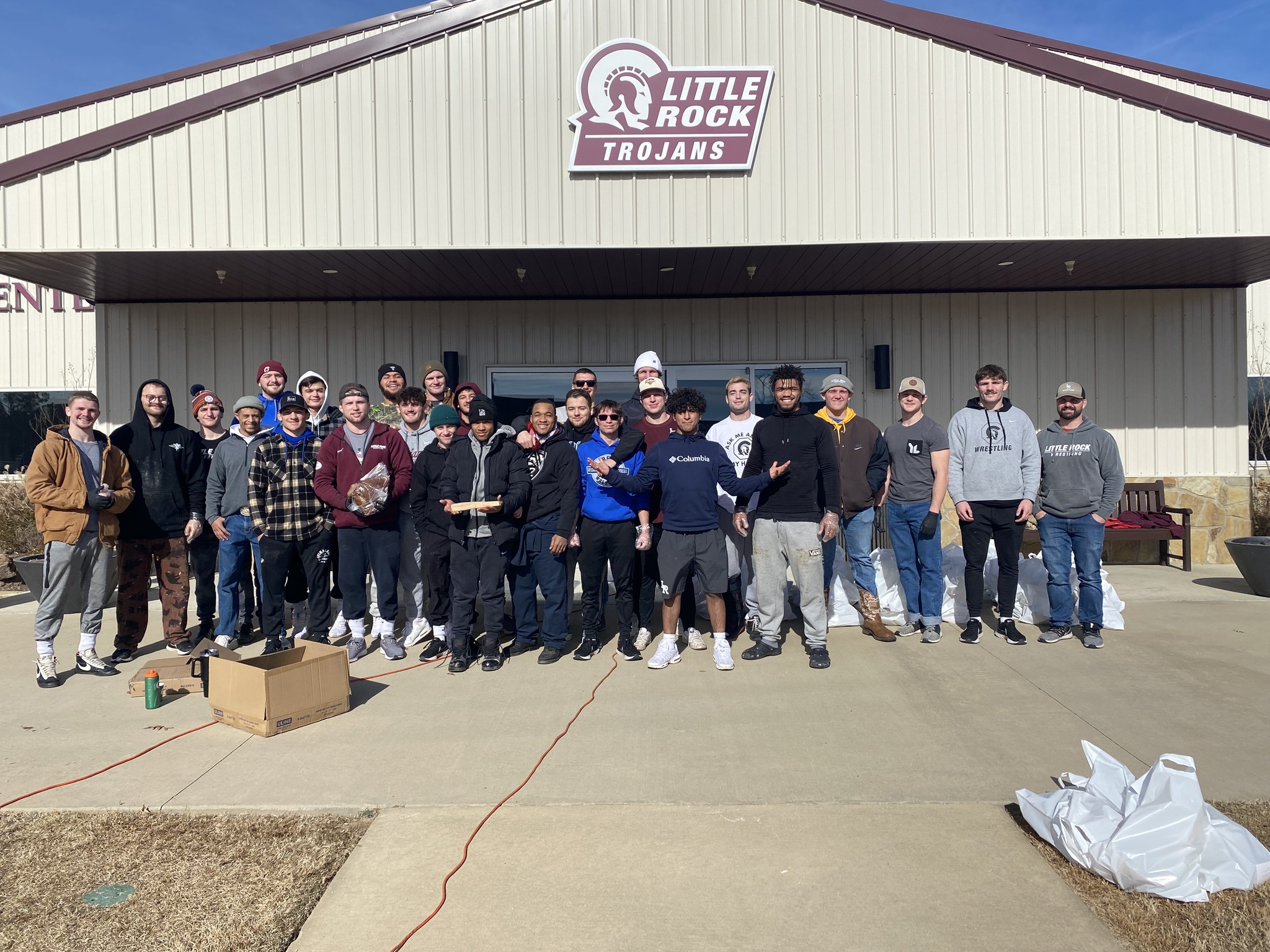 These Little Rock Wrestling Team members helped bring some holiday cheer to the people of central Arkansas by donating about 250 hams to the nonprofit Every Arkansan.