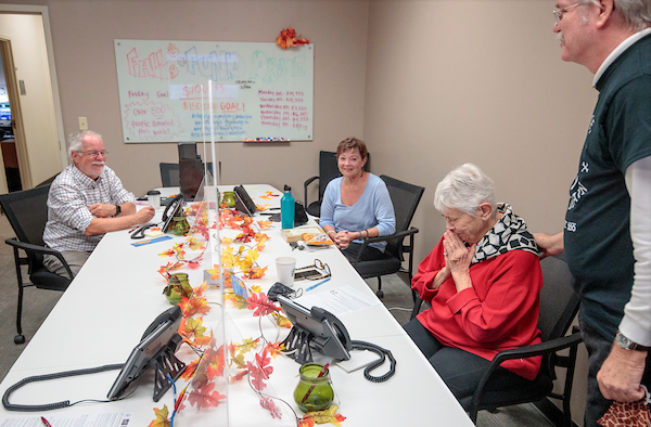 Little Rock Public Radio volunteers take calls from donors during a fund drive. Photo by Ben Krain.