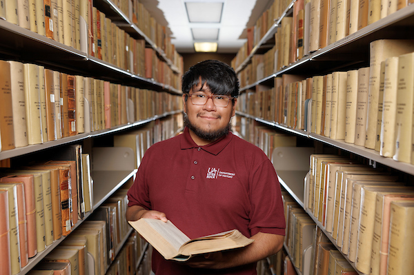 Armando Arellano will graduate in May 2024 with a master's degree in public history. Photo by Gracelyn Johnson.