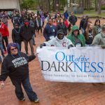UA Little Rock employees, students, alumni, and community members participate in the Out of the Darkness Campus Walk to prevent suicide. Photo by Ben Krain.