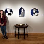 Courtney Wilson, a member of the new cohort of artLAUNCH recipients at UA Little Rock, is shown with some of her artwork.