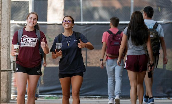 UA Little Rock students walk across campus on their way to class during the first day of the fall 2023 semester. Photo by Benjamin Krain.