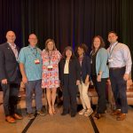 Dr. Carrie Phillips attends the 2024 CASE District IV Conference in San Antonio, Texas, with UA Little Rock colleagues, from left to right, Christian O'Neal, Anthony Buttrum, Dr. Phillips, Chancellor Christina Drale, Laterika Tooks, Muriel Schrepfer, and Noah Henkell.