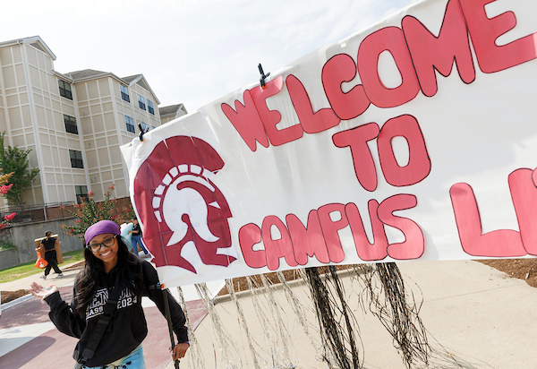 Incoming students get some help from their parents and volunteers moving belongings into the residence halls for the fall 2024 semester. Photo by Benjamin Krain.