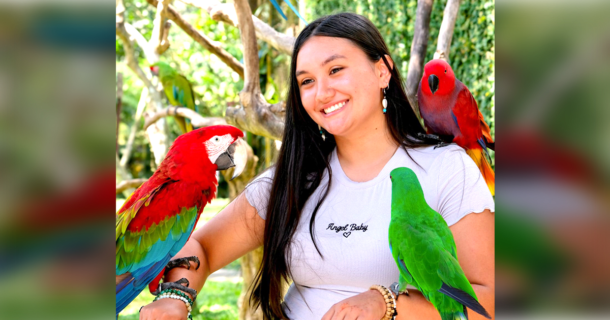 Maria Waite learns about bird conservation and sustainable acquisition and trade while visiting the Bali Bird Park.