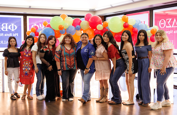 UA Little Rock students celebrate the start of Hispanic Heritage Month in the Trojan Cafe at the Hispanic/Latin Initiative's Por La Cultura Kickoff event. Photo by Beatriz Garcia.