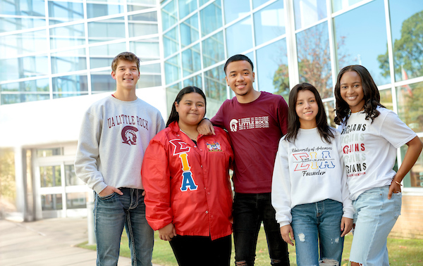 Five students enjoy a fall day at the University of Arkansas at Little Rock. Photo by Benjamin Krain.