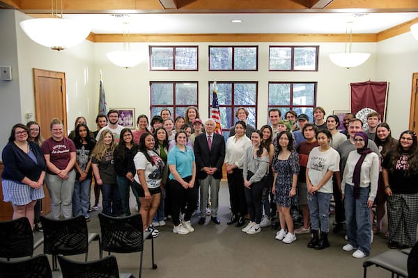 Former Supreme Allied Commander of NATO, General Wesley Clark, visits with students in the Donaghey Scholars Honors Program. Photo by Benjamin Krain.
