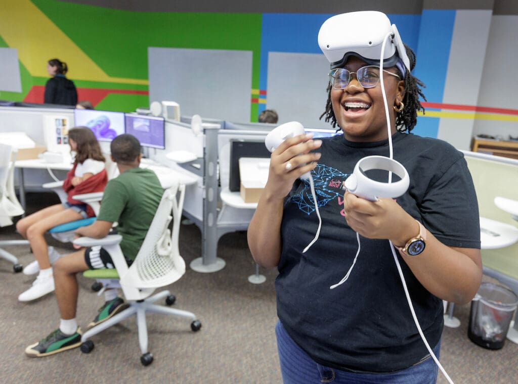 Middle school students participate in a UA Little Rock Virtual Reality Summer Camp at the Emerging Analytics Center. Photo by Benjamin Krain.