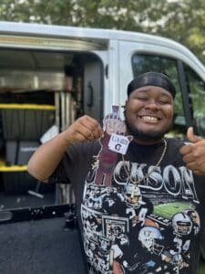 UA Little Rock student Zachary Farmer works with the Grip and Electric Team on the set of "Before We Knew" in Georgia.