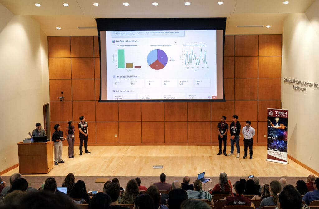 Participants in the AI and Mental Health Hackathon present their team pitches to judges and community members during a pitch competition. Photo by Benjamin Krain.