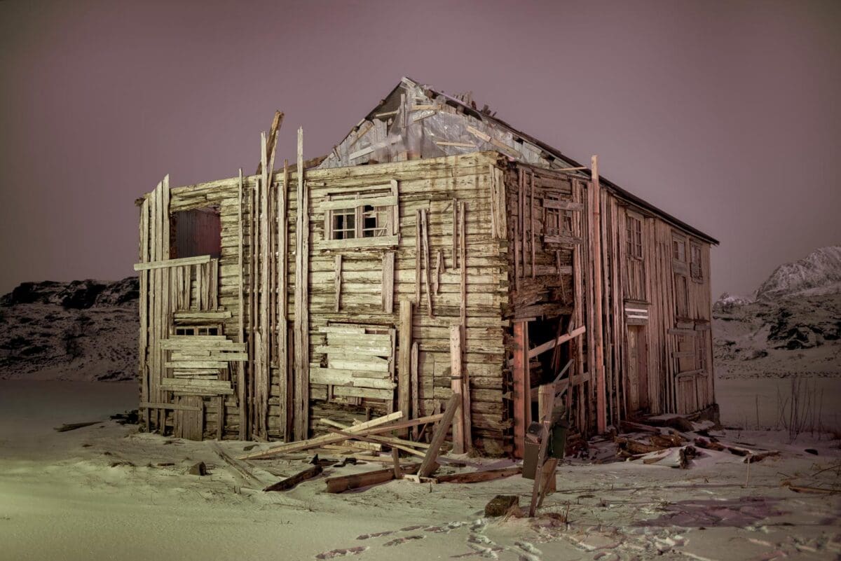 Weathered wooden building in a snowy landscape at night. Image: Todd Hido, 1139-2923