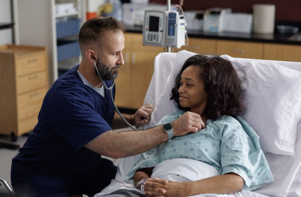 A student practices for a healthcare career at the University of Arkansas at Little Rock.
