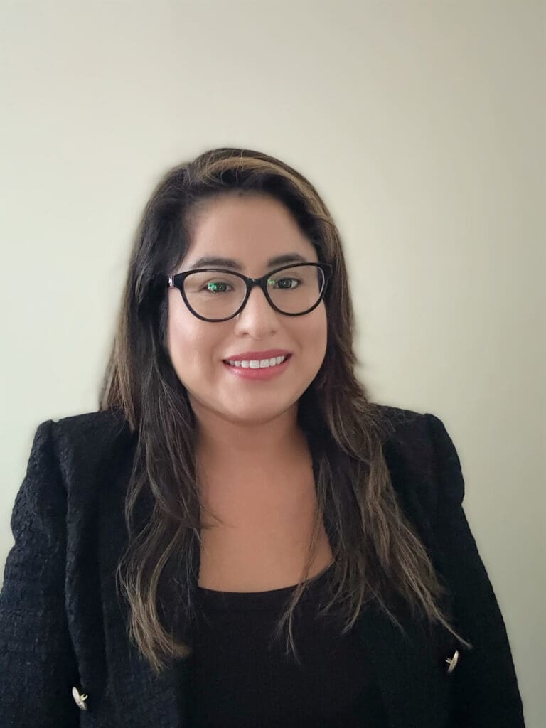 Elizabeth Sotelo in black suit