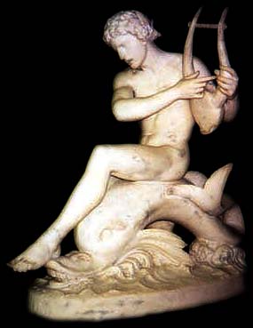 photo of marble sculpture of Arion riding dolphin