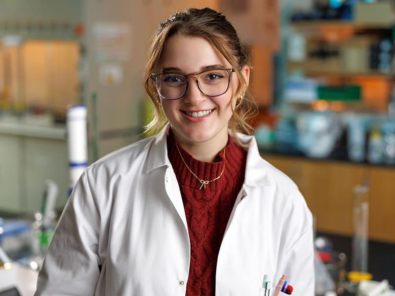 Female student in science lab.